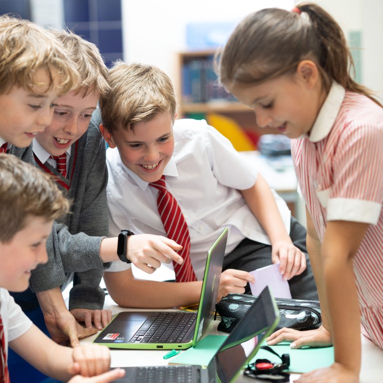 students on laptops