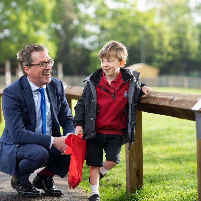 student with a teacher