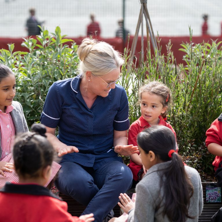 students learning outdoors