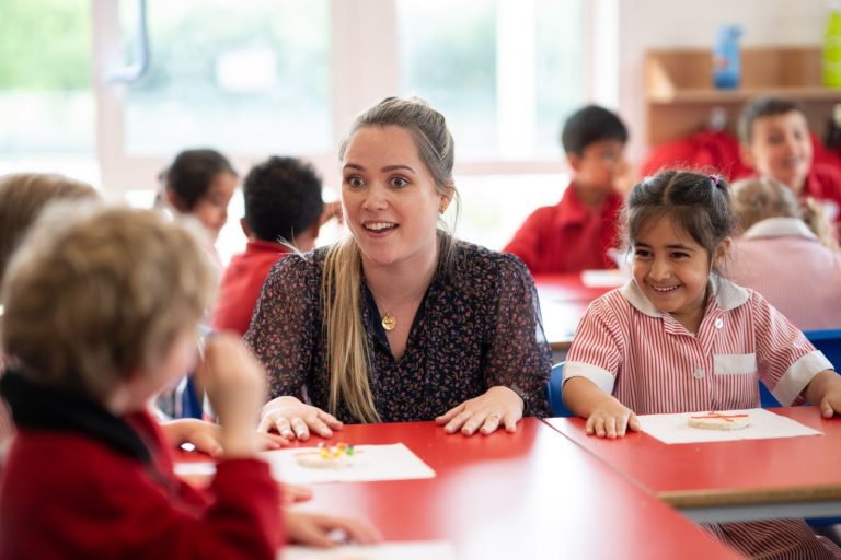 teacher talking to students