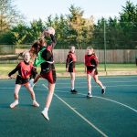 students playing netball