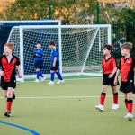 boys playing football