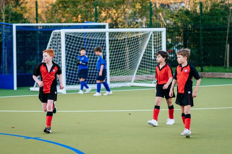 boys playing football