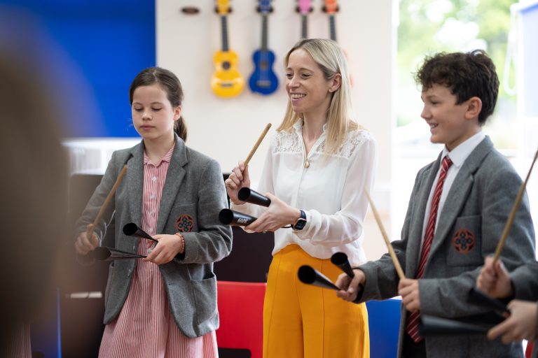 students using percussion instruments